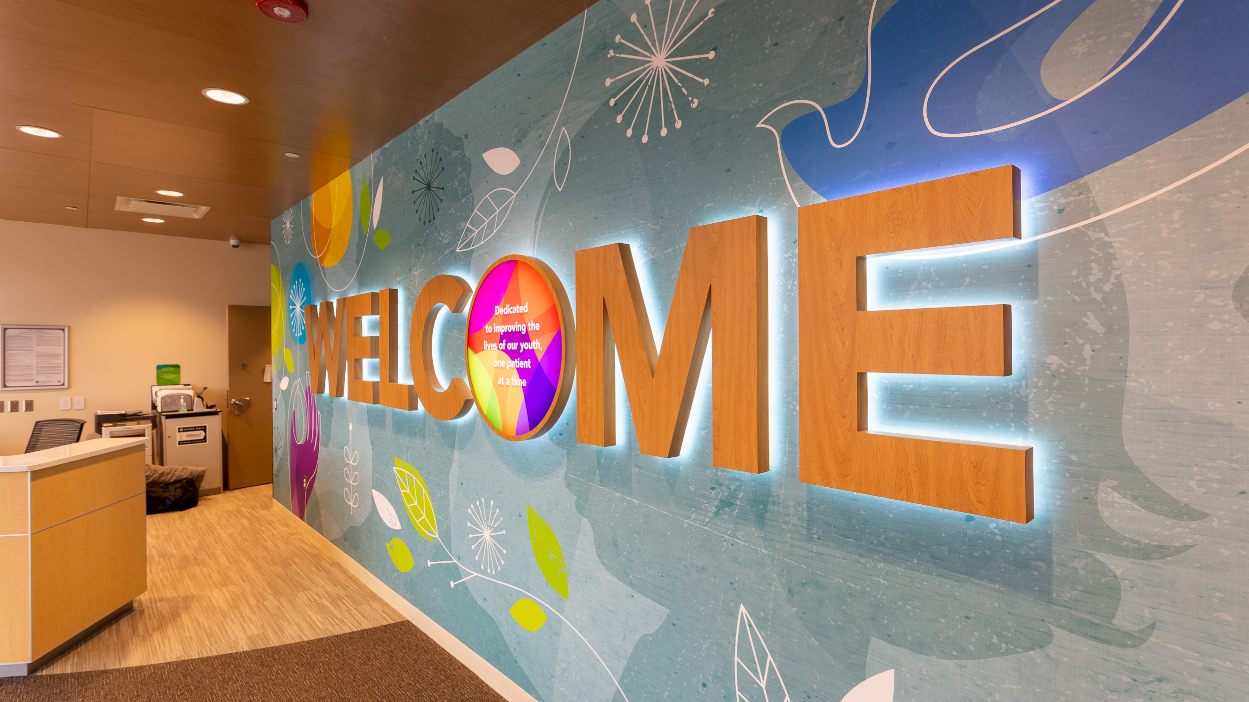 UnityPoint Health Meriter Entrance Feature Wall LED Back Lit Dimensional Welcome Custom Wallpaper Detail Photo