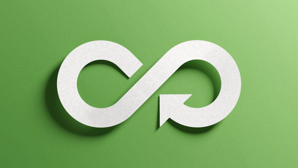 A green infinity symbol with an arrow, representing sustainability and eco-friendly practices, on a textured green background.