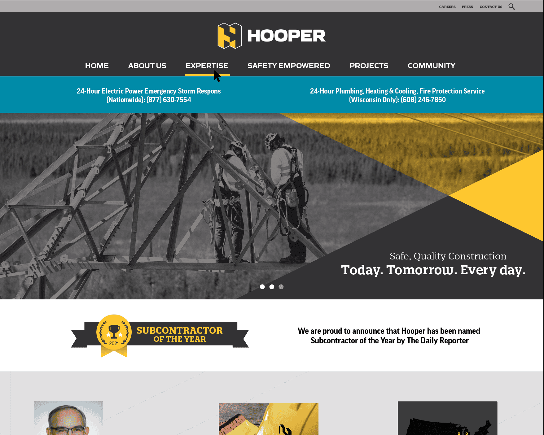 A website homepage design for Hooper, a construction and contracting company. The layout features a black, yellow, and gray color scheme, with a strong emphasis on expertise, safety, and projects. A hero image of workers on a power structure is overlaid with the tagline “Safe, Quality Construction. Today. Tomorrow. Every day.” A golden badge highlights Hooper’s recognition as the 2021 Subcontractor of the Year by The Daily Reporter. Below, three content sections feature: A Message from the President with a headshot and company statement. Careers at Hooper, represented by a yellow hard hat with the Hooper logo. Company Locations, shown through a map of the U.S. with Hooper’s locations marked. The footer includes corporate headquarters and fabrication facility addresses, along with links to careers, press, community, and contact information.