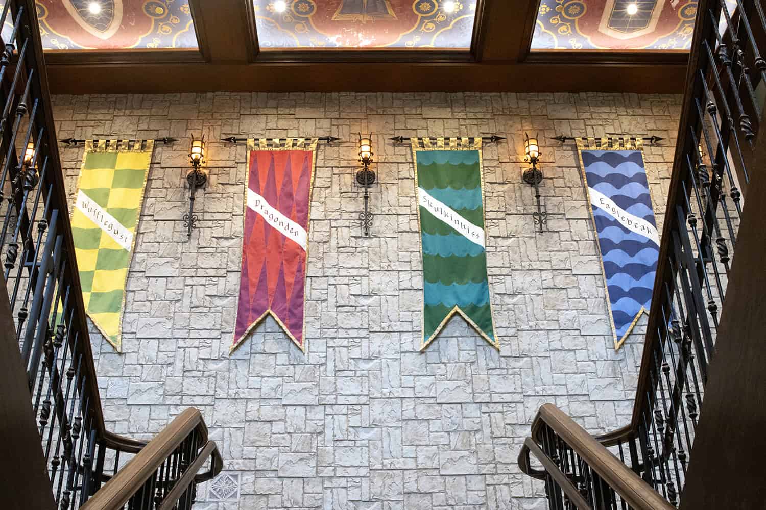 Four colorful medieval-style banners labeled 