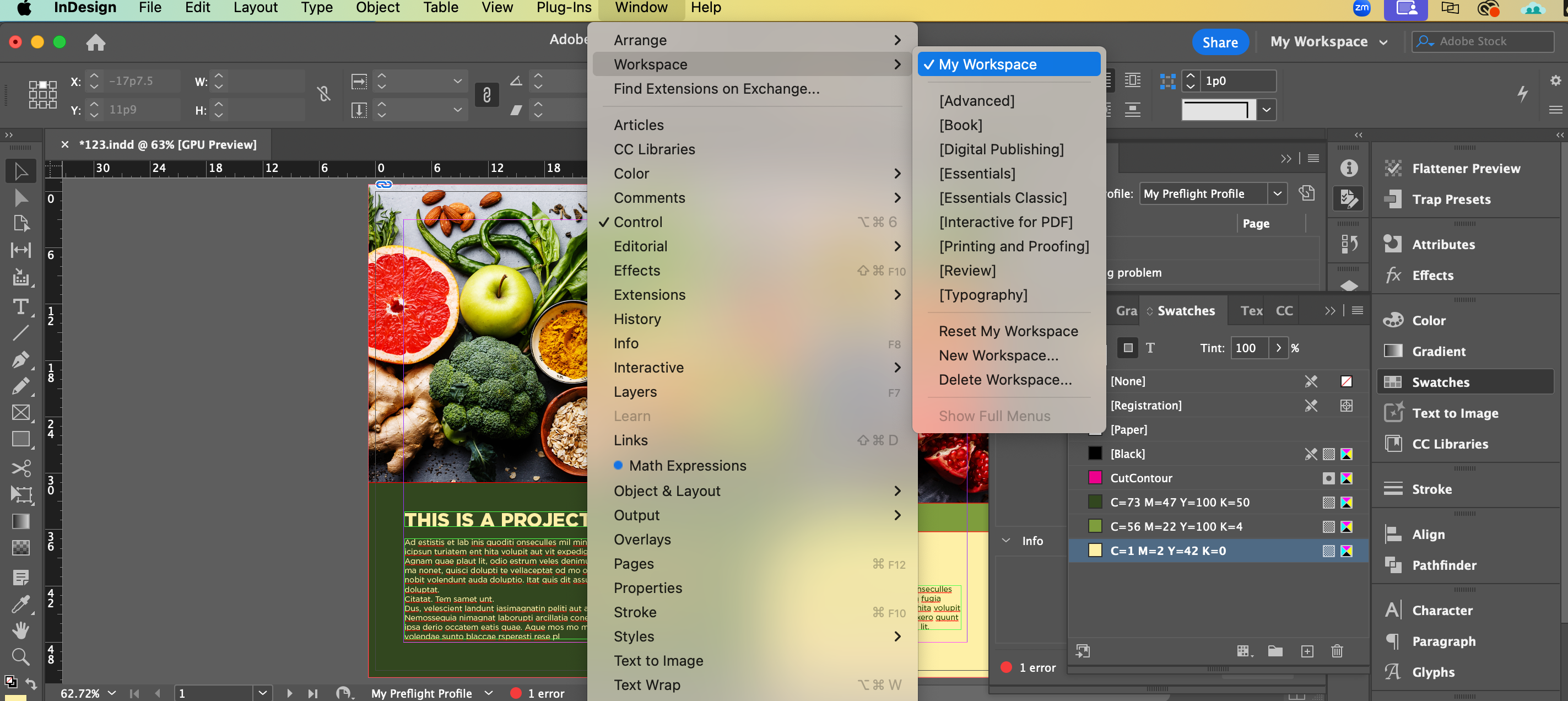 Adobe InDesign window with the Workspace menu open, showing options like My Workspace, Essentials, Printing and Proofing, and Typography. A document with colorful produce and text is visible in the main workspace.