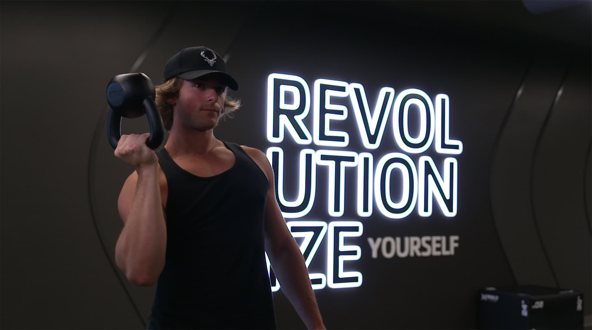 Colony Brands Green County YMCA LED Lit Display & Someone Lifting Weights