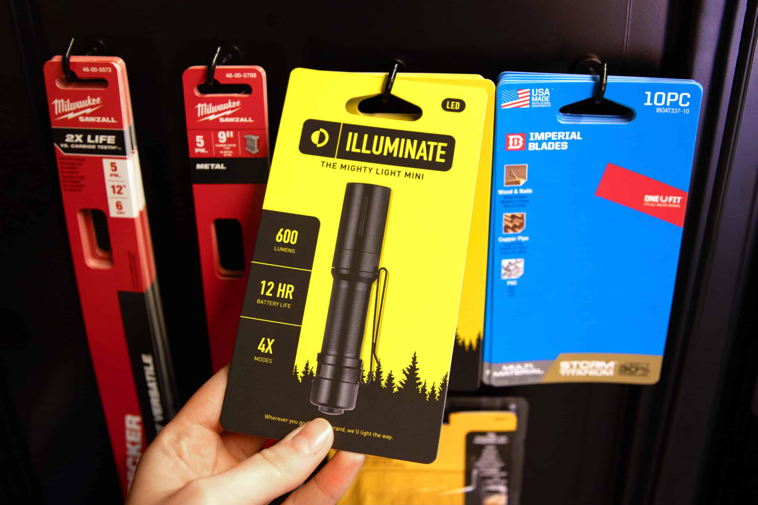 Hand Reaching For Card Packaging