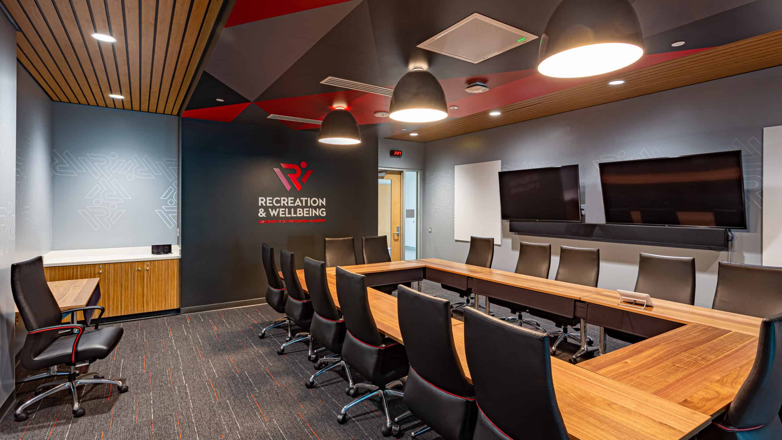 Red, black and grey conference room for 16 people at University of Wisconsin-Madison's Nicholas Recreation and Wellbeing Center