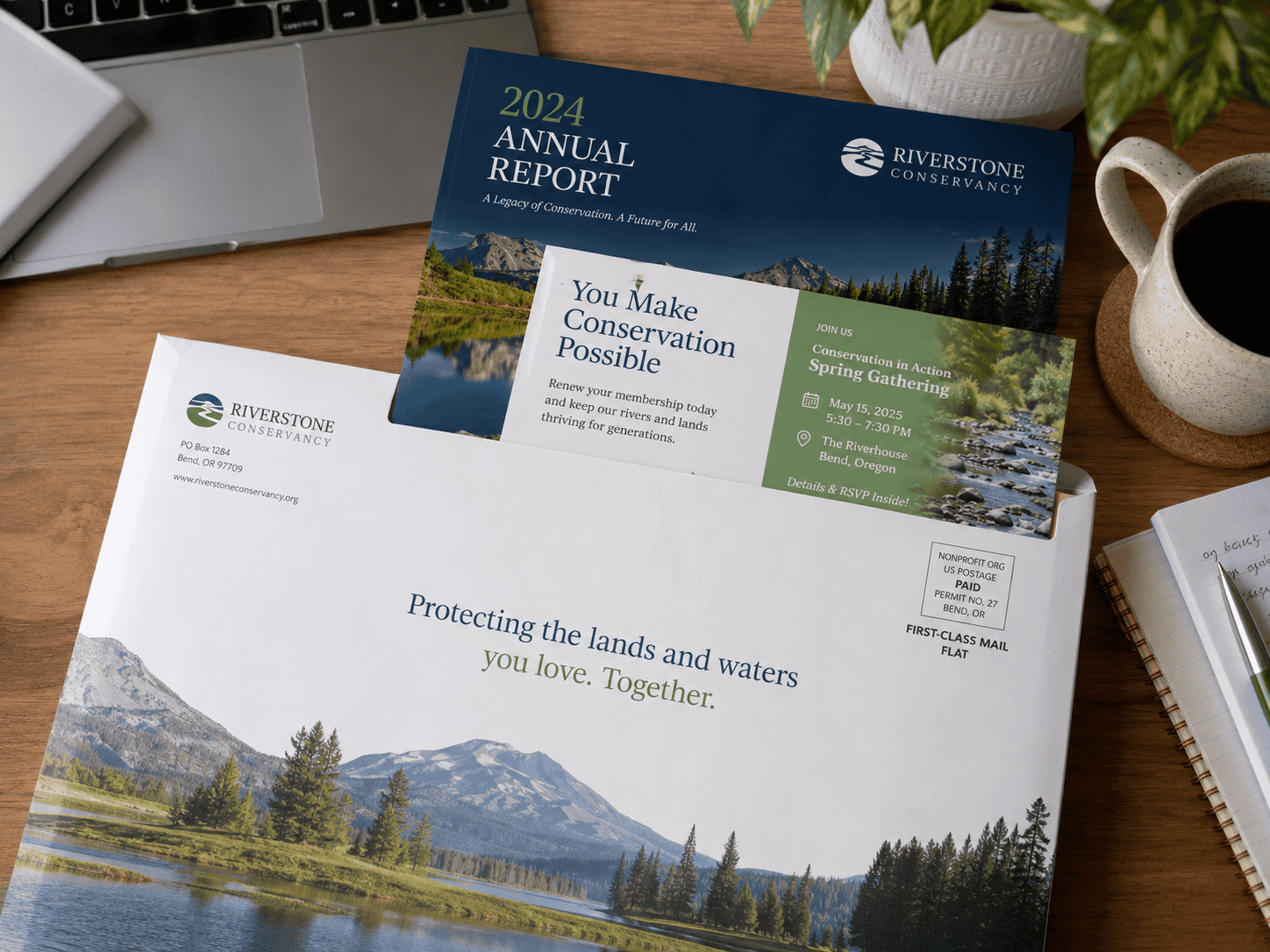 A First-Class Mail nonprofit flat features an annual report and membership event insert partially removed from a large envelope on a desk.